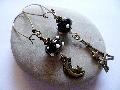 Boucles d\'oreilles perles noires  lune tour eiffe